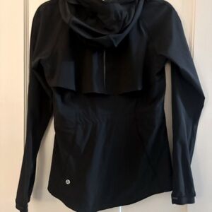 Lululemon waterproof jacket Black. Size 6. Detachable hood.